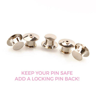 a group of pin locks sitting on top of a white surface
