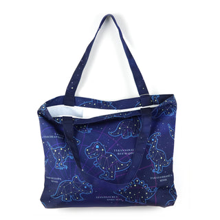 Blue tote bag with dinosaur constellation design on a white background