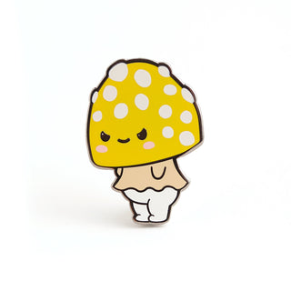 a yellow mushroom with a white polka dot on it
